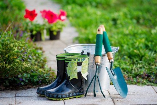 Team of gardeners arriving at a Docklands property with equipment.
